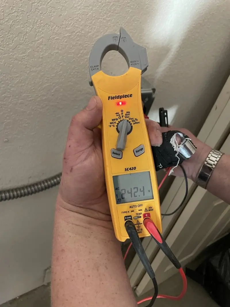 Voltage testing with clamp meter during Circuit Breaker Repair in Piscataway